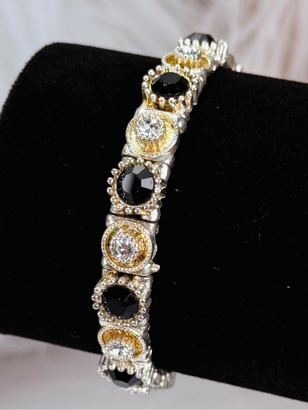 Silvertone with black bling, reflective stretch bracelet